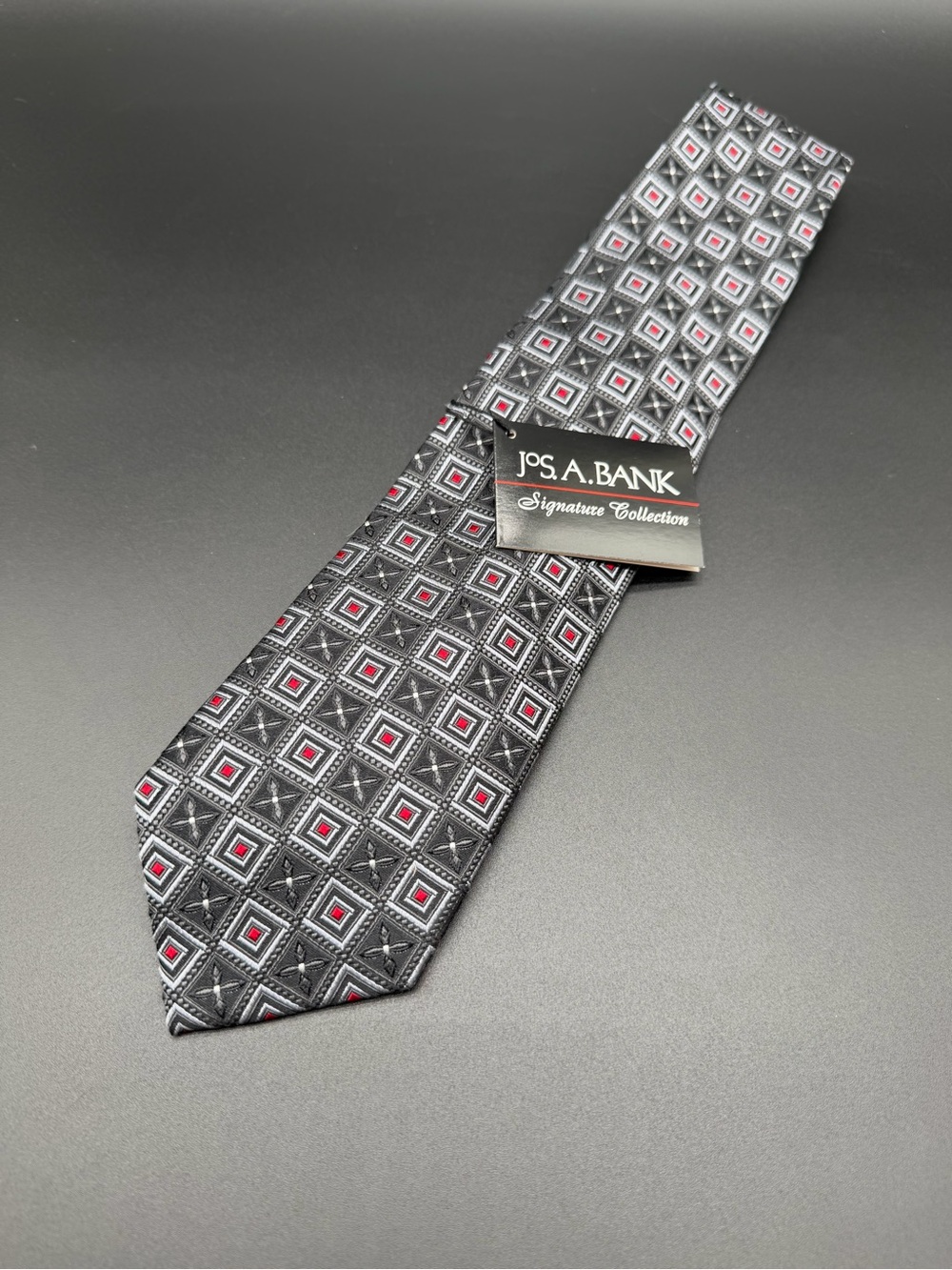Jos. A. Bank Black Silk Tie with Red and Silver Geometric Squares